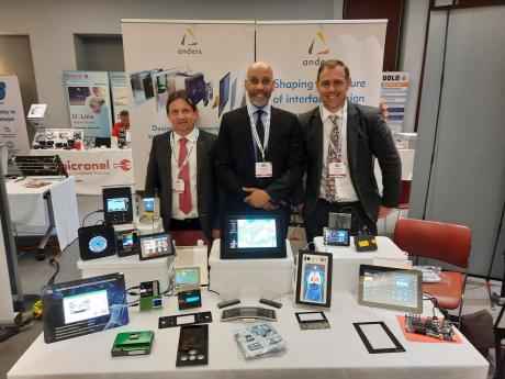 Mike, Rhett and David from Anders Electronics behind display products