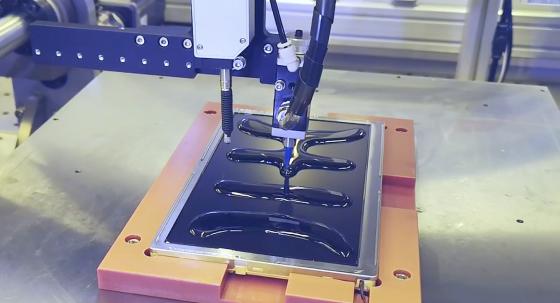 display being optically bonded to reduce reflection and improve readability